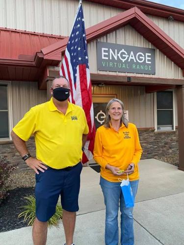 Judge Dunn and Julie Schafer of the 9th District Court of Appeals practicing virtual shooting.